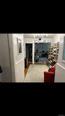 a view of a livingroom with furniture and a fireplace