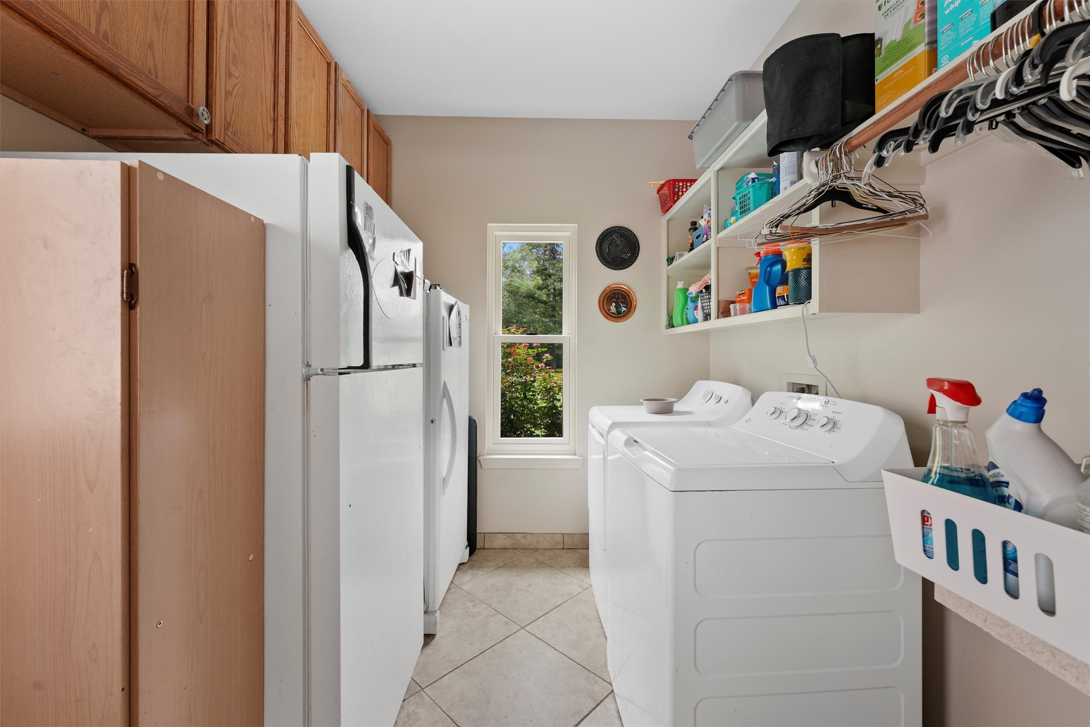 6803 Treaschwig Road Spring, TX 77373 - Photo 13 of 22 a utility room with dryer and washer