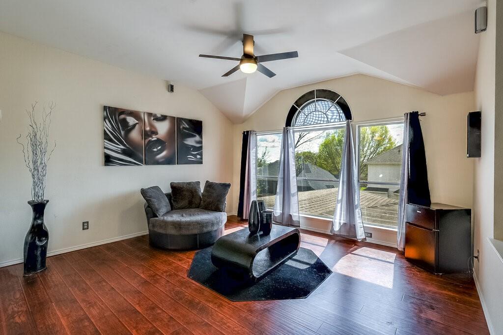 706 Gentry Drive Arlington, TX 76018 - Photo 5 of 39 a living room with furniture and a large window