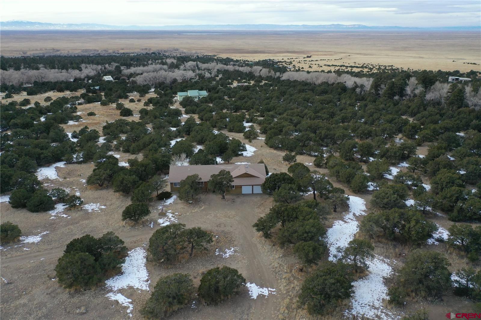105 Indian Hill Road Mosca, CO 81146 - Photo 1 of 38 Primary Residence faces East towards the Sangre De Cristo Mountain range.
