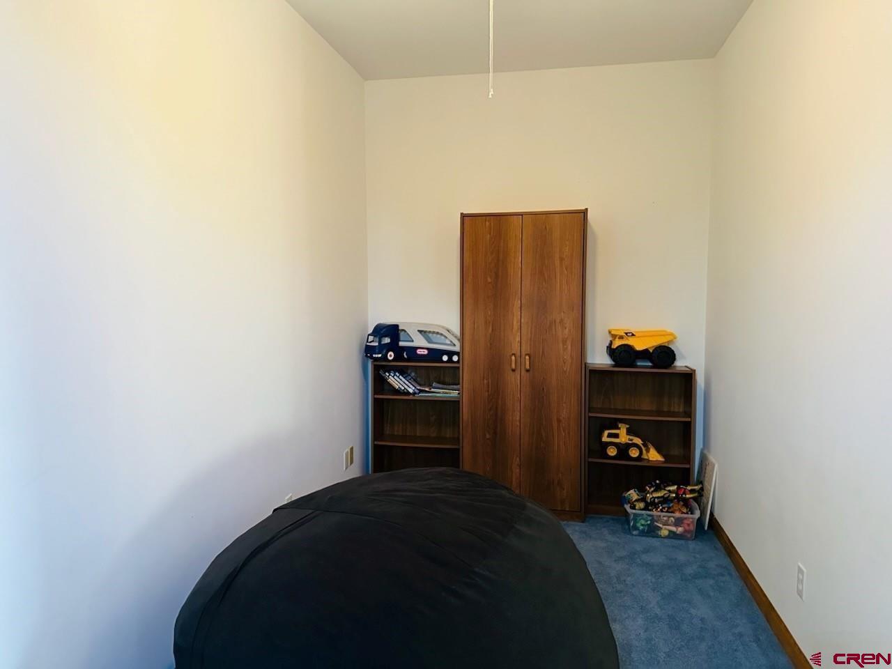 105 Indian Hill Road Mosca, CO 81146 - Photo 25 of 38 Den - has no closet, window could be a closet or whatever you want it to be.