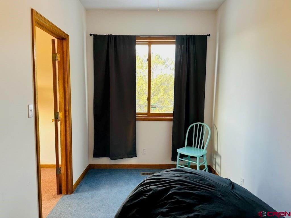 105 Indian Hill Road Mosca, CO 81146 - Photo 26 of 38 Den - has a nice window.