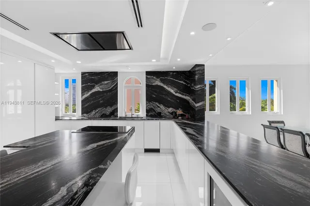 a bathroom with a toilet sink and shower