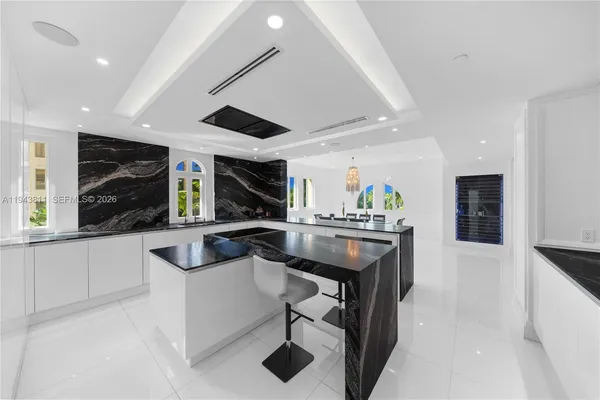a potted plant sitting in front of a bathroom