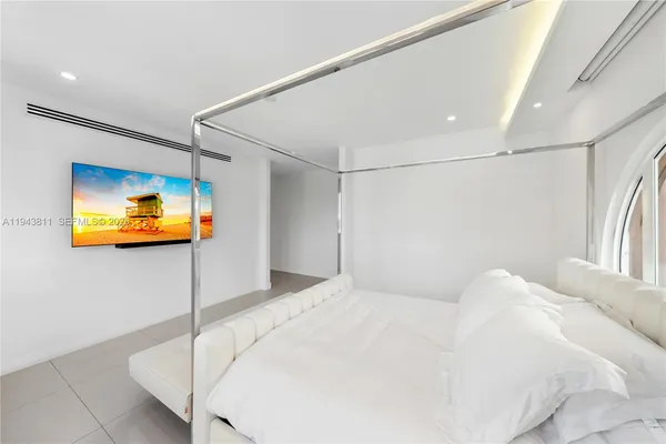 a bathroom with a toilet sink and shower