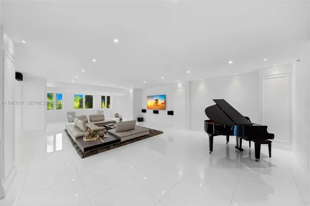 a living room with furniture and furniture