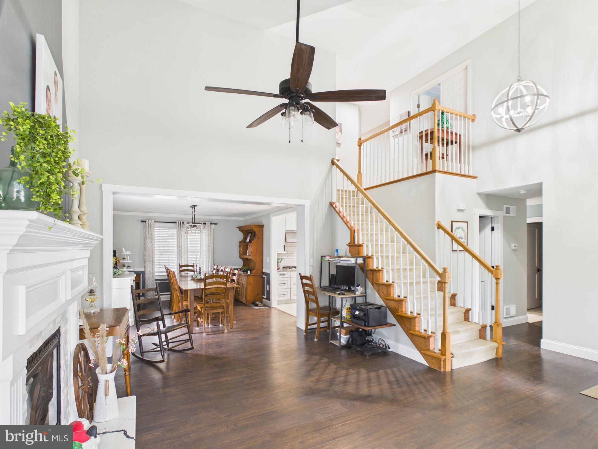119 Saybrooke Drive Lititz, PA 17543 - Photo 8 of 40 a view of entryway livingroom and hall with wooden floor