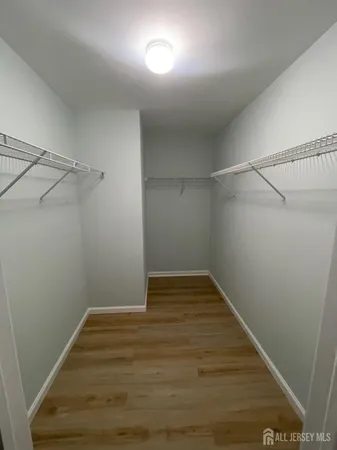 a view of a room with racks on the wall