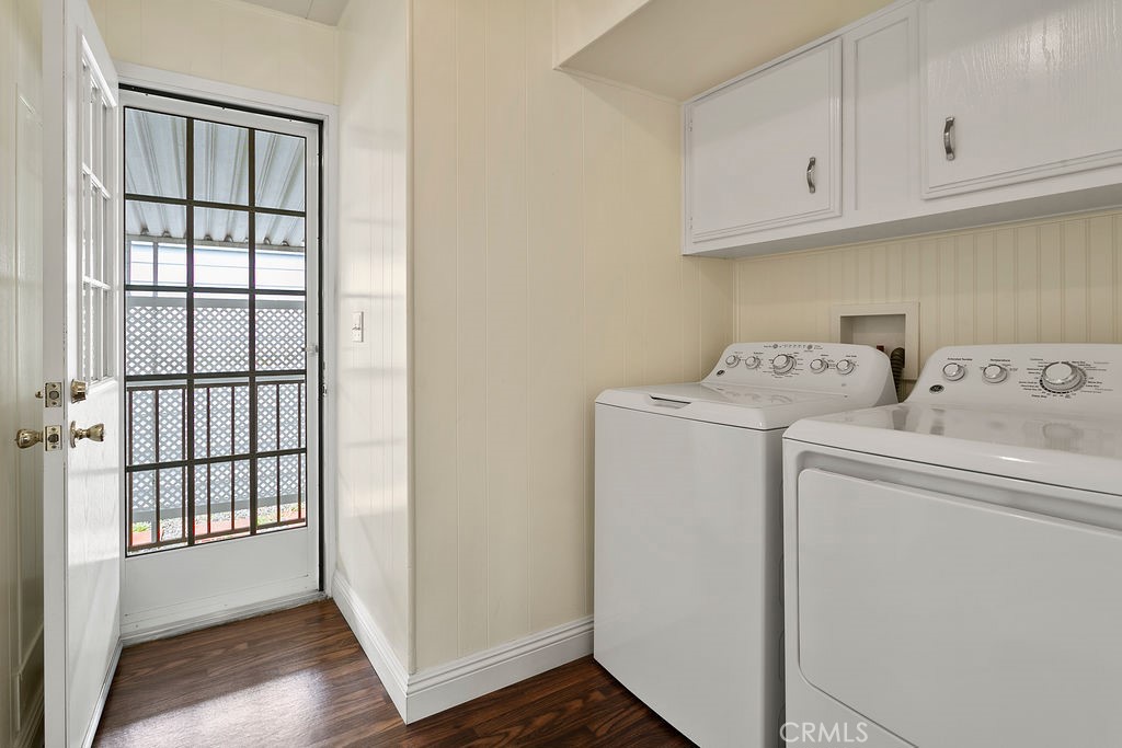 24921 Muirlands Boulevard, Unit 23 Lake Forest, CA 92630 - Photo 22 of 27 a view of storage and utility room with washer and dryer