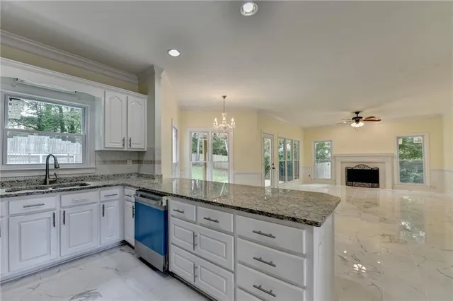 a view of entryway with a window and wooden floor