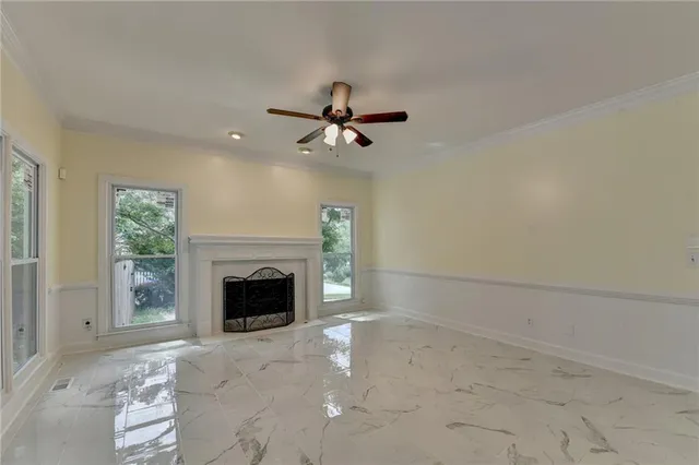 a bathroom with a granite countertop sink mirror and a bathtub