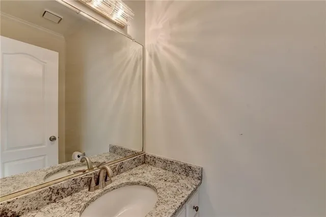 a view of an empty room and wooden floor