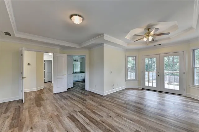 a view of a backyard with sitting area