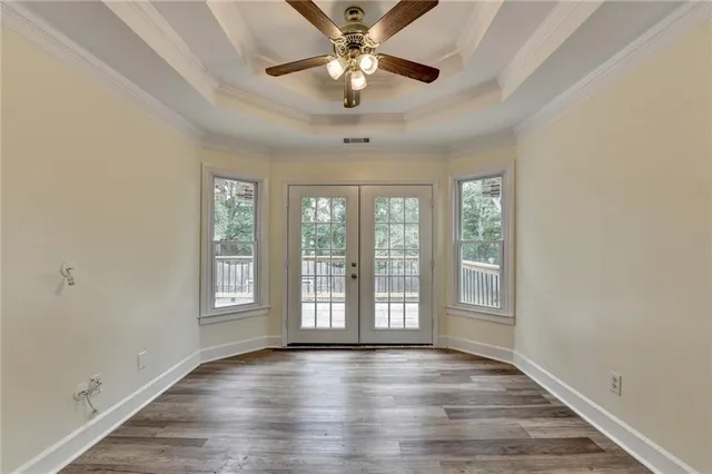 a view of a backyard with fence