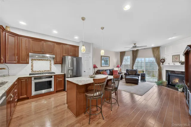 a picture of a bathroom with mirror on the wall