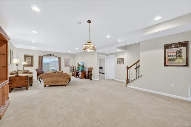 a workspace with furniture and a window