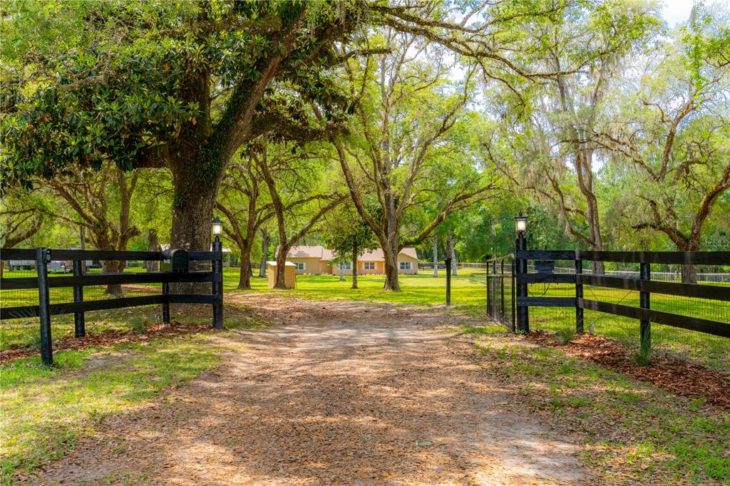19126 Phillips Road Brooksville, FL 34604 - Photo 1 of 1 Gated Entrance