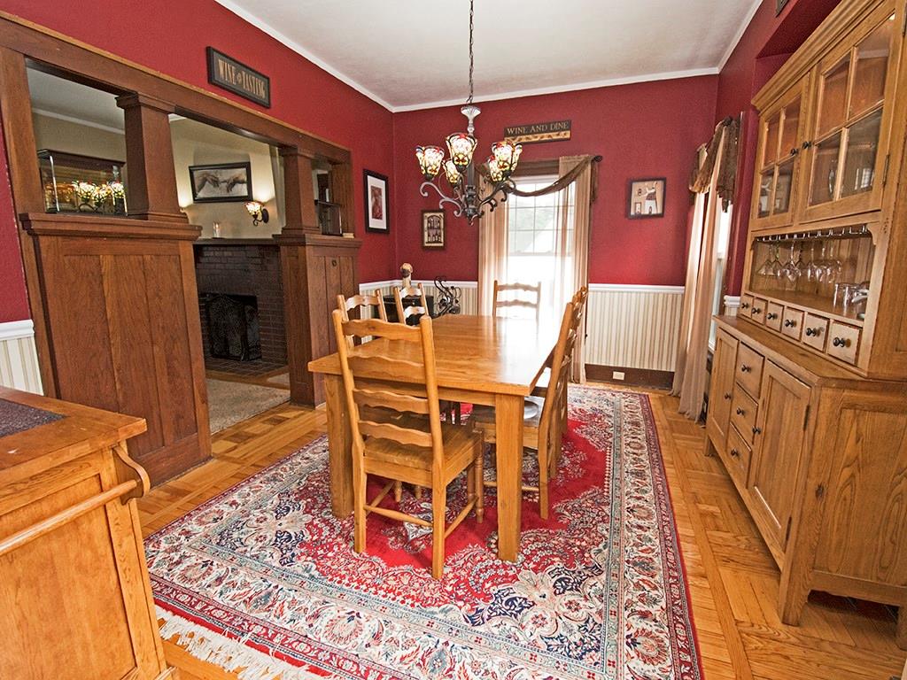 4480 Rodenbaugh Avenue Pittsburgh, PA 15214 - Photo 3 of 10 Spacious dining room with gorgeous HW floors that offers easy access to kitchen and enclosed sunroom.