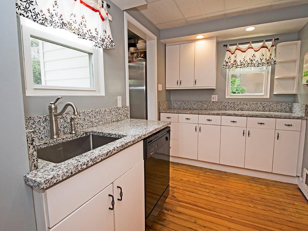 4480 Rodenbaugh Avenue Pittsburgh, PA 15214 - Photo 5 of 10 Kitchen upgraded with granite countertops and lots of cabinet/storage space.