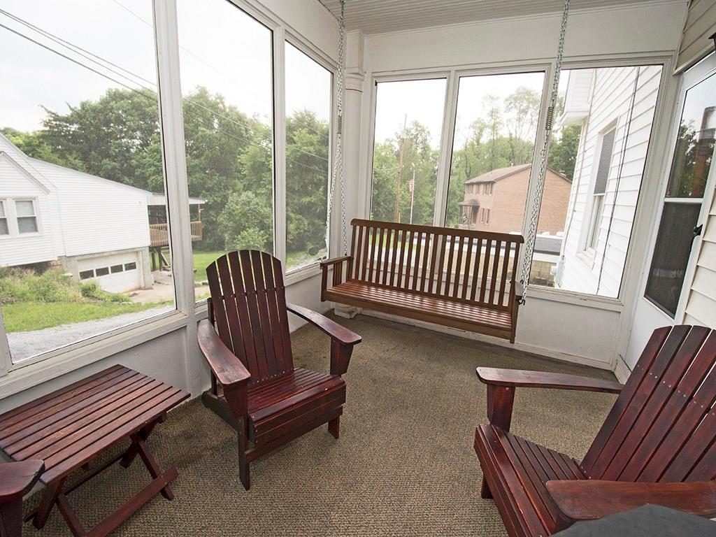 4480 Rodenbaugh Avenue Pittsburgh, PA 15214 - Photo 6 of 10 Relax and Enjoy the sunsets from your enclosed sunroom, which sits right off of the main living area.