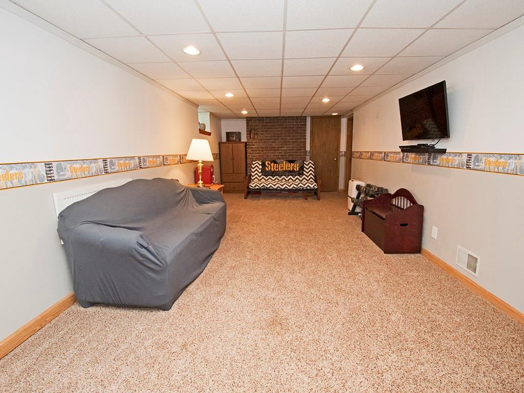 4480 Rodenbaugh Avenue Pittsburgh, PA 15214 - Photo 9 of 10 Additional entertainment space available in the finished basement, along with ANOTHER full bath! Lots of storage!