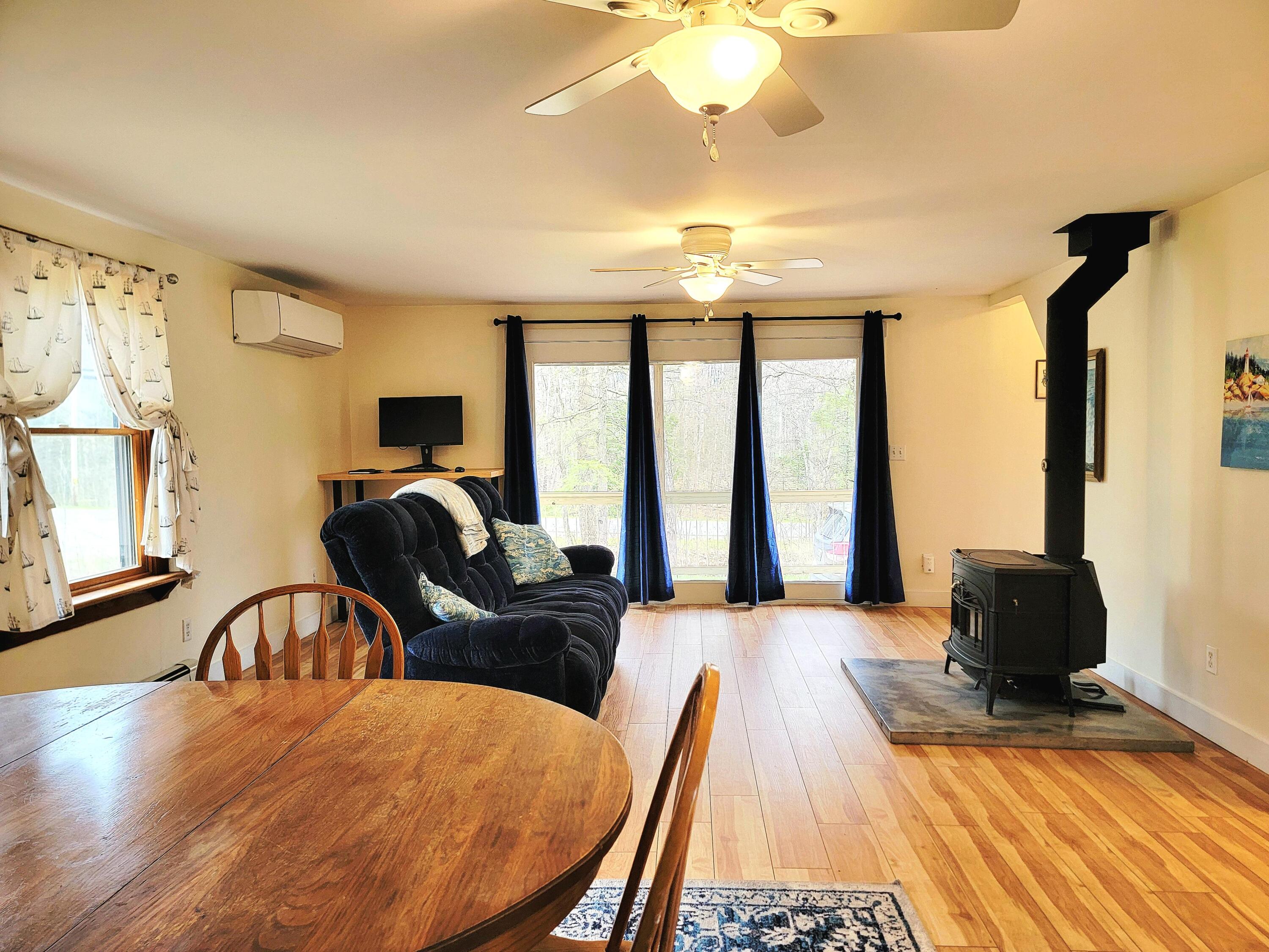 6 Skyscraper Hill Road Brooks, ME 04921 - Photo 12 of 44 Open Living and Dining Room