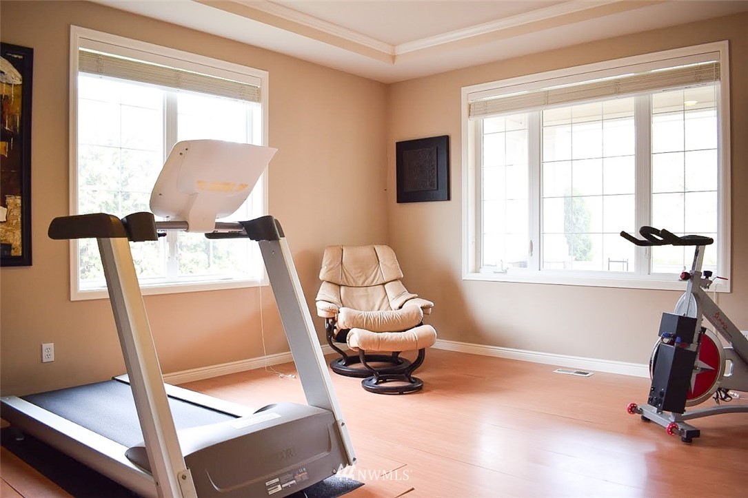 1217 South 36th Place Renton, WA 98055 - Photo 9 of 15 a room with chair and window