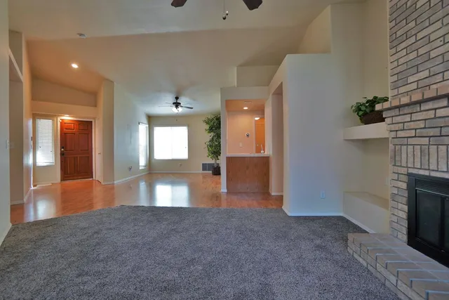 a living room with a fireplace