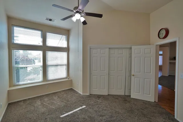 a view of a room with racks on the wall