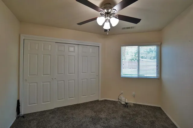 a bathroom with a tub sink shower and mirror