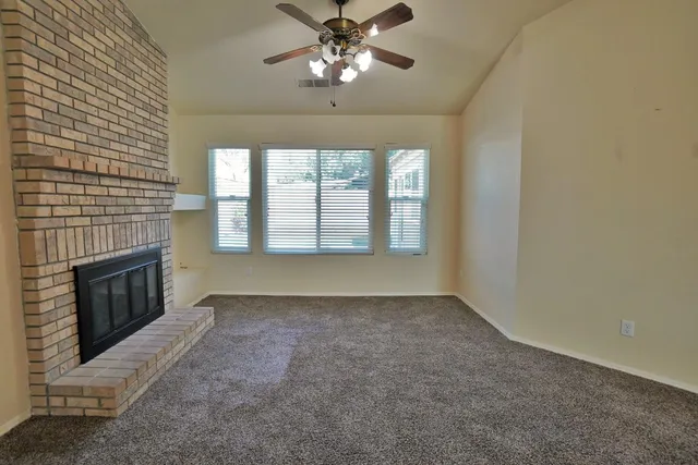 a front view of house with yard and porch