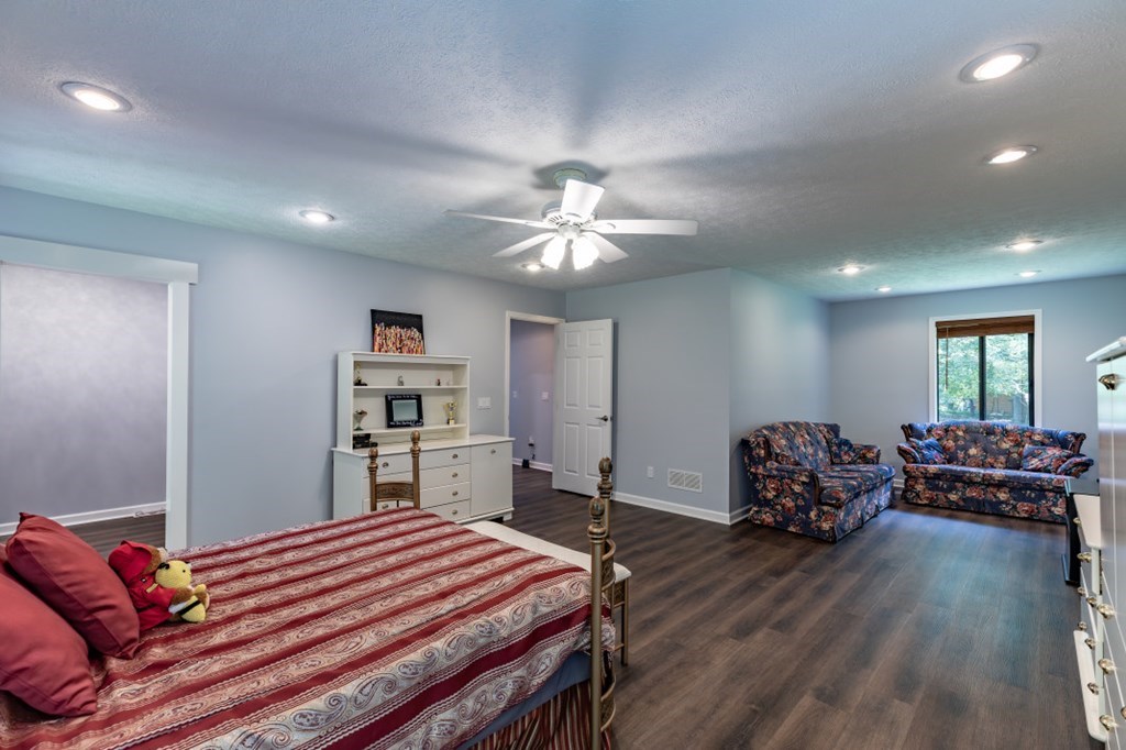 94 Brer Rabbit Trail Jasper, GA 30143 - Photo 21 of 37 a bedroom with furniture and wooden floor