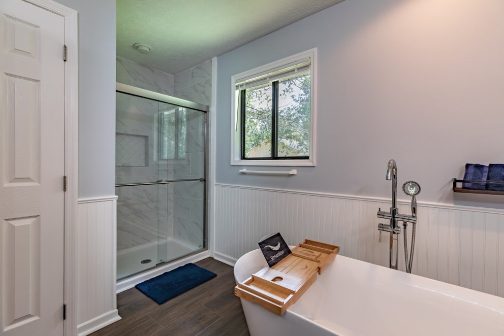 94 Brer Rabbit Trail Jasper, GA 30143 - Photo 22 of 37 a room with a window and wooden floor