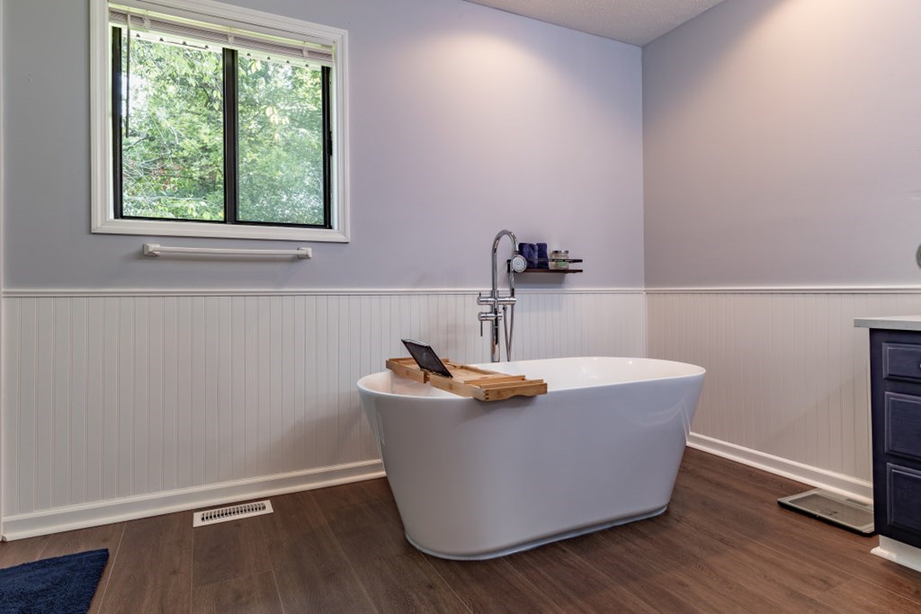 94 Brer Rabbit Trail Jasper, GA 30143 - Photo 23 of 37 a room with a sink and wooden floor