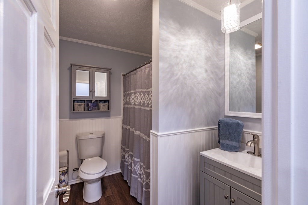 94 Brer Rabbit Trail Jasper, GA 30143 - Photo 25 of 37 a bathroom with a sink a toilet and shower