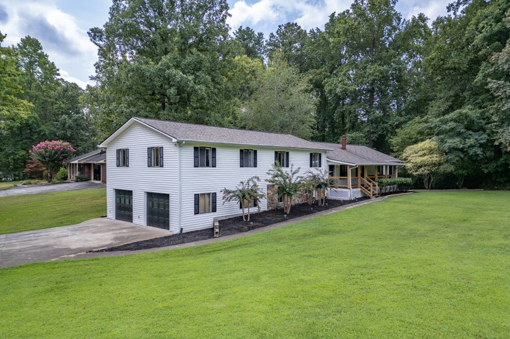 94 Brer Rabbit Trail Jasper, GA 30143 - Photo 32 of 37 a front view of a house with yard and green space