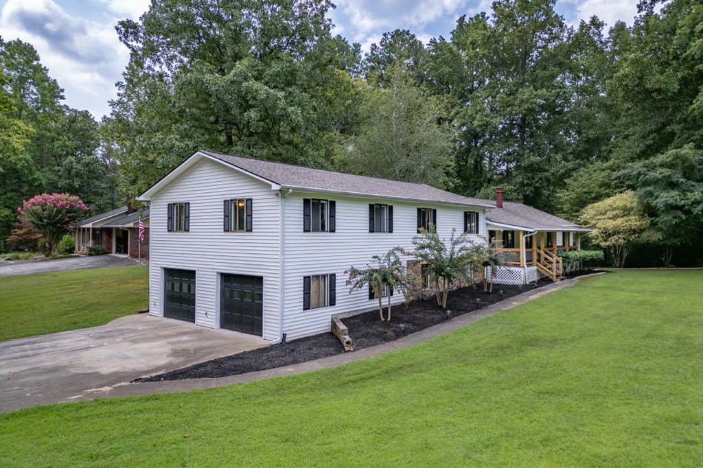 94 Brer Rabbit Trail Jasper, GA 30143 - Photo 33 of 37 a front view of house with yard and green space