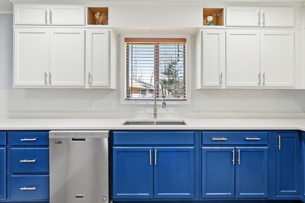 94 Brer Rabbit Trail Jasper, GA 30143 - Photo 41 of 54 a kitchen with granite countertop cabinets and window