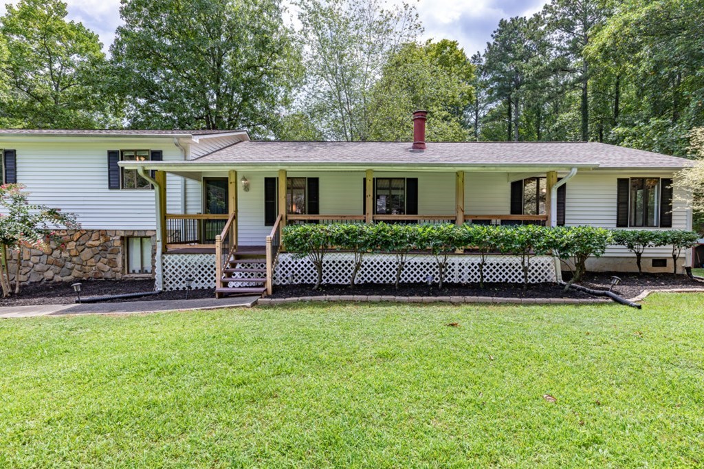 94 Brer Rabbit Trail Jasper, GA 30143 - Photo 5 of 37 a front view of house with yard and porch