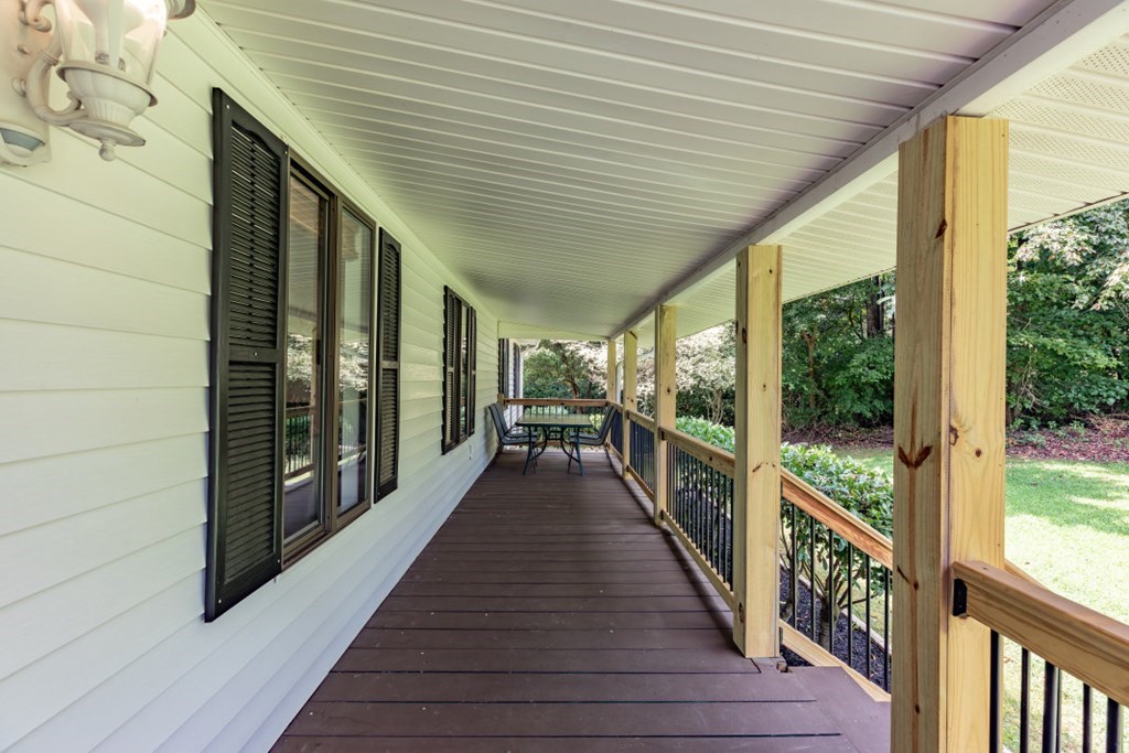 94 Brer Rabbit Trail Jasper, GA 30143 - Photo 7 of 37 a view of a porch with wooden floor