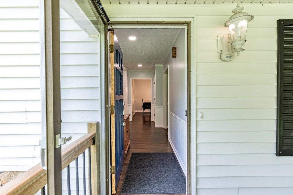 94 Brer Rabbit Trail Jasper, GA 30143 - Photo 8 of 37 a view of a hallway with wooden floor