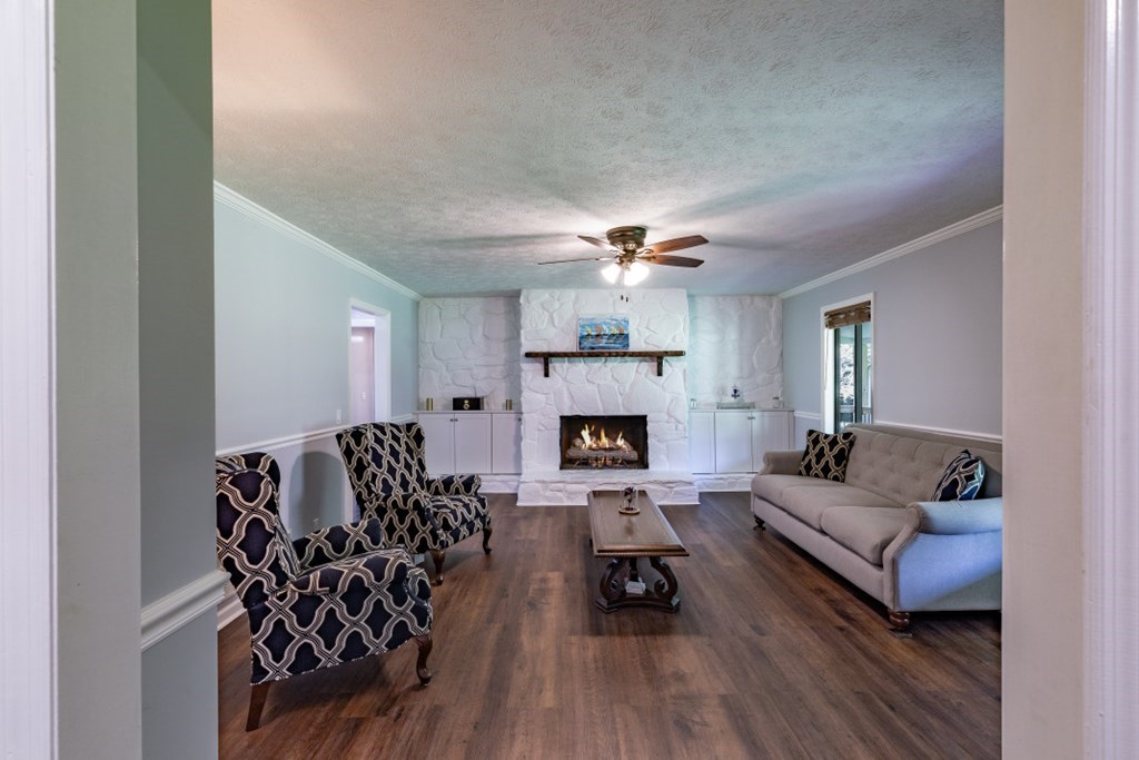 94 Brer Rabbit Trail Jasper, GA 30143 - Photo 9 of 37 a living room with furniture and a fireplace
