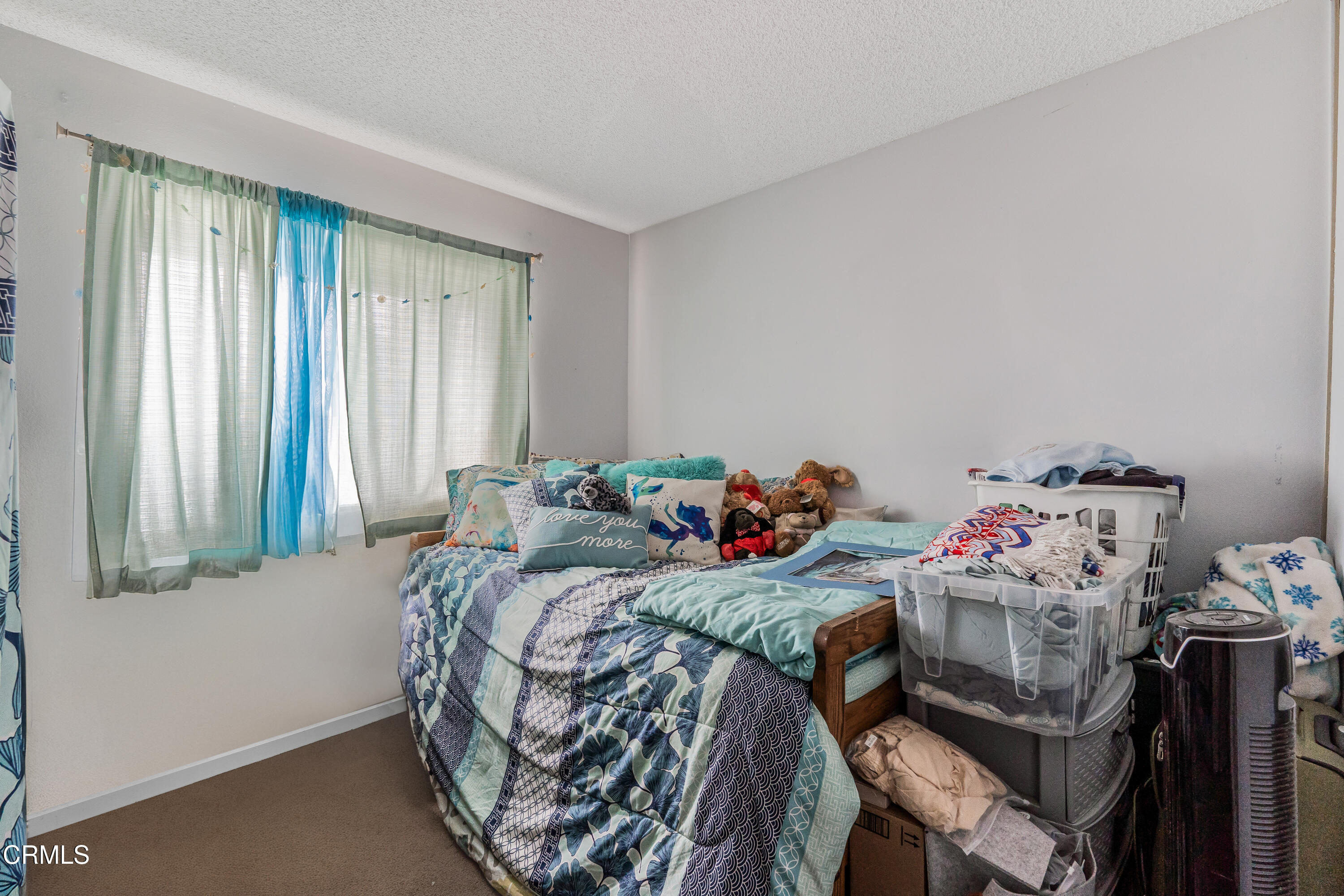 5289 Perkins Road Oxnard, CA 93033 - Photo 13 of 23 a bedroom with two beds and a window