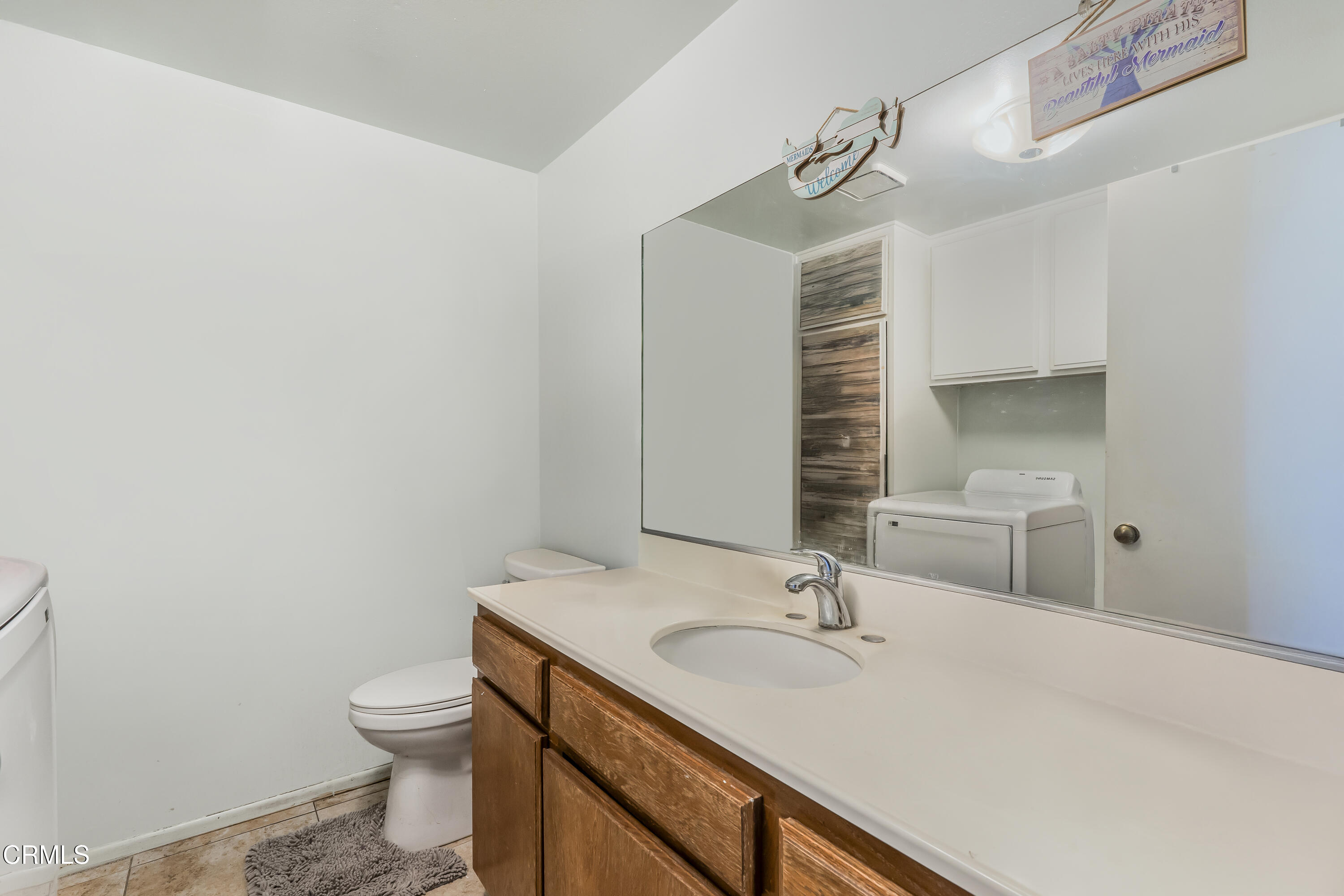 5289 Perkins Road Oxnard, CA 93033 - Photo 14 of 23 a bathroom with a sink and a toilet