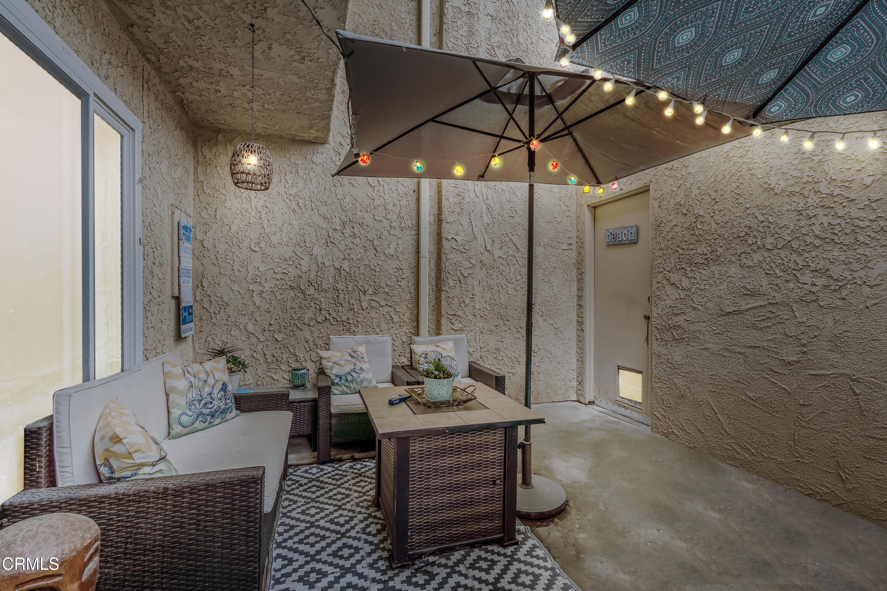 5289 Perkins Road Oxnard, CA 93033 - Photo 17 of 23 a living room with furniture and a table