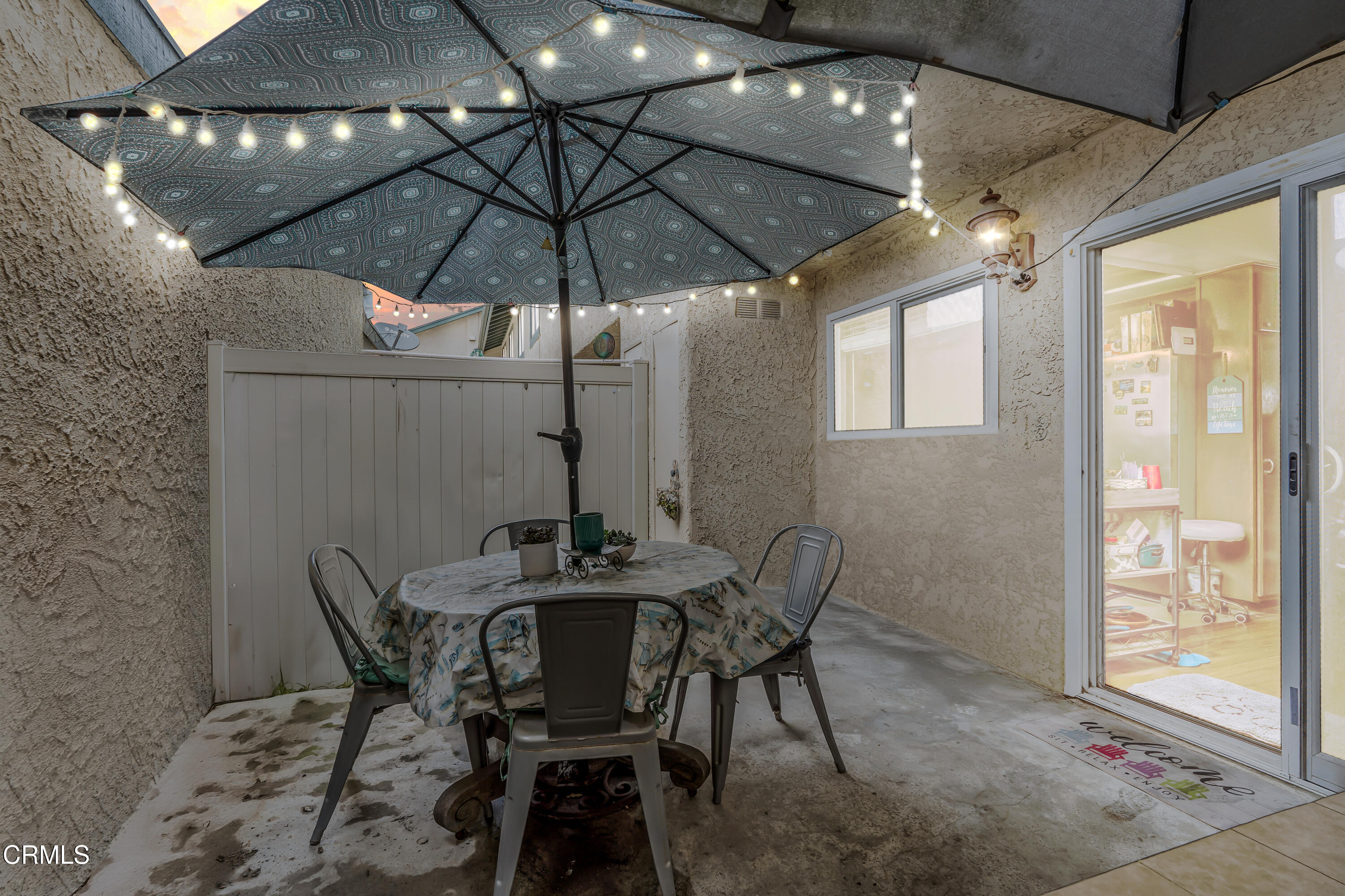 5289 Perkins Road Oxnard, CA 93033 - Photo 19 of 23 a view of a dining room with furniture and chandelier