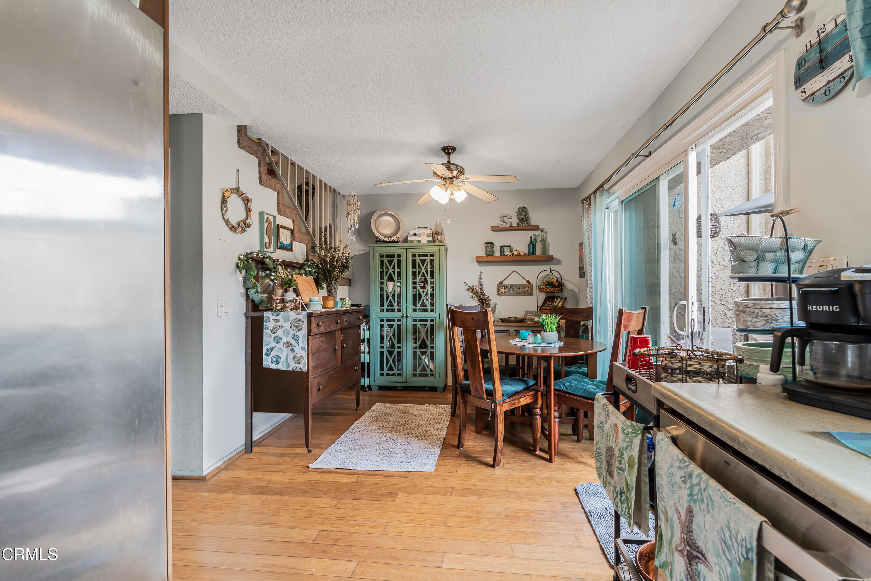 5289 Perkins Road Oxnard, CA 93033 - Photo 4 of 23 a view of a dining room with furniture window and wooden floor