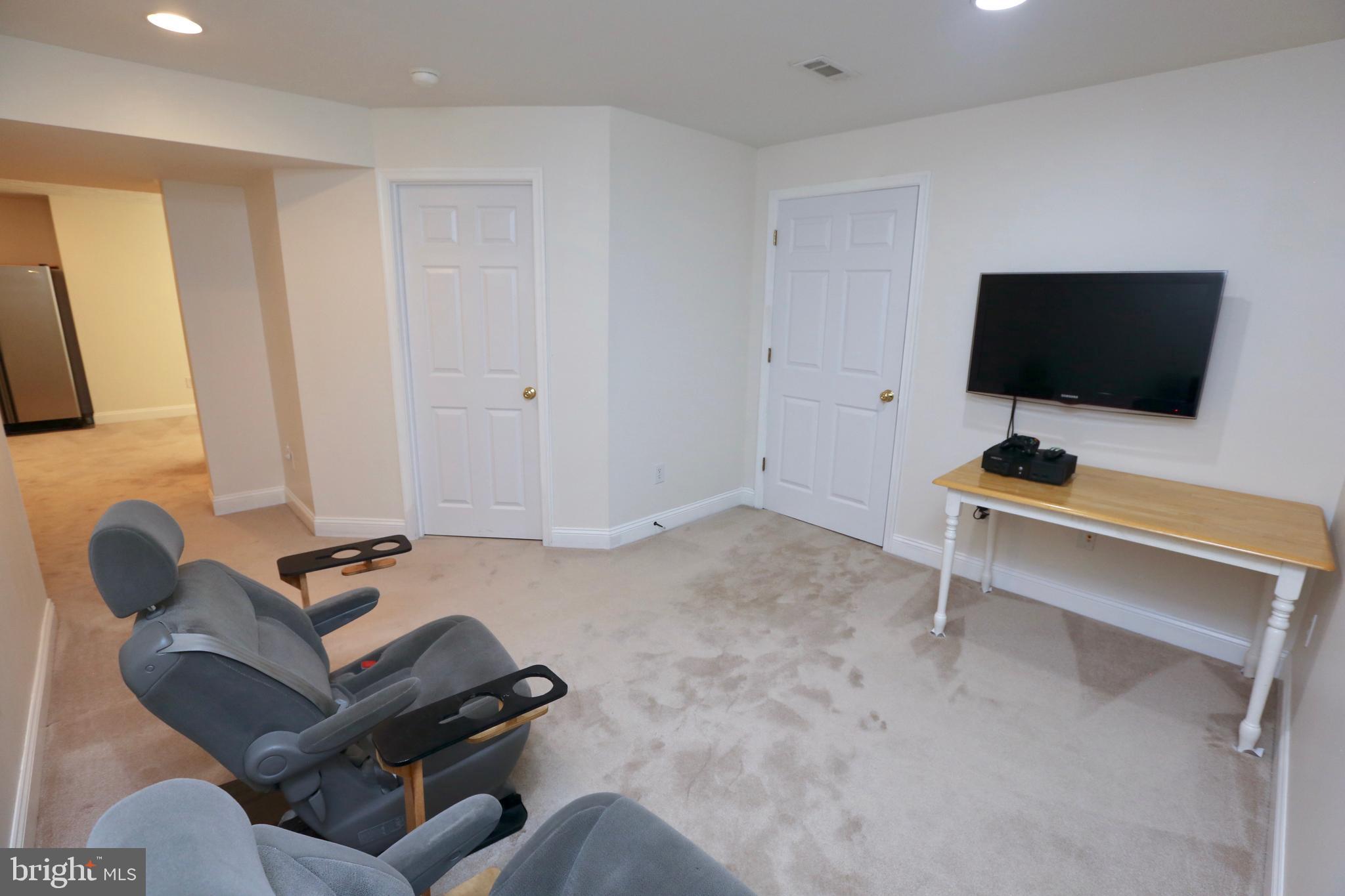 42556 Flemming Drive Chantilly, VA 20152 - Photo 67 of 84 GAME ROOM WITH TV