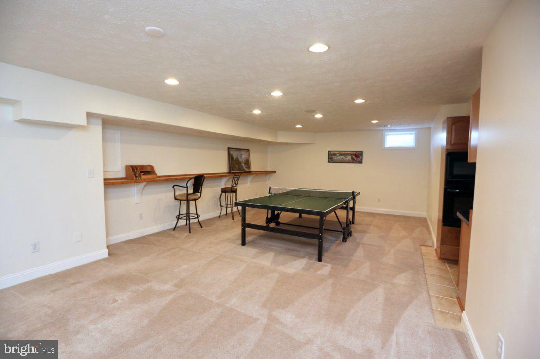 42556 Flemming Drive Chantilly, VA 20152 - Photo 70 of 84 VIEW OF LARGE REC ROOM WITH PING PONG TABLE