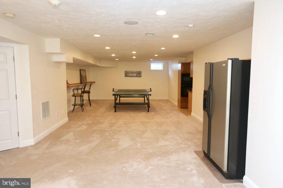42556 Flemming Drive Chantilly, VA 20152 - Photo 71 of 84 REC ROOM WITH EXTRA FRIG